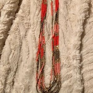 Multi strand coral, peach, gold necklace